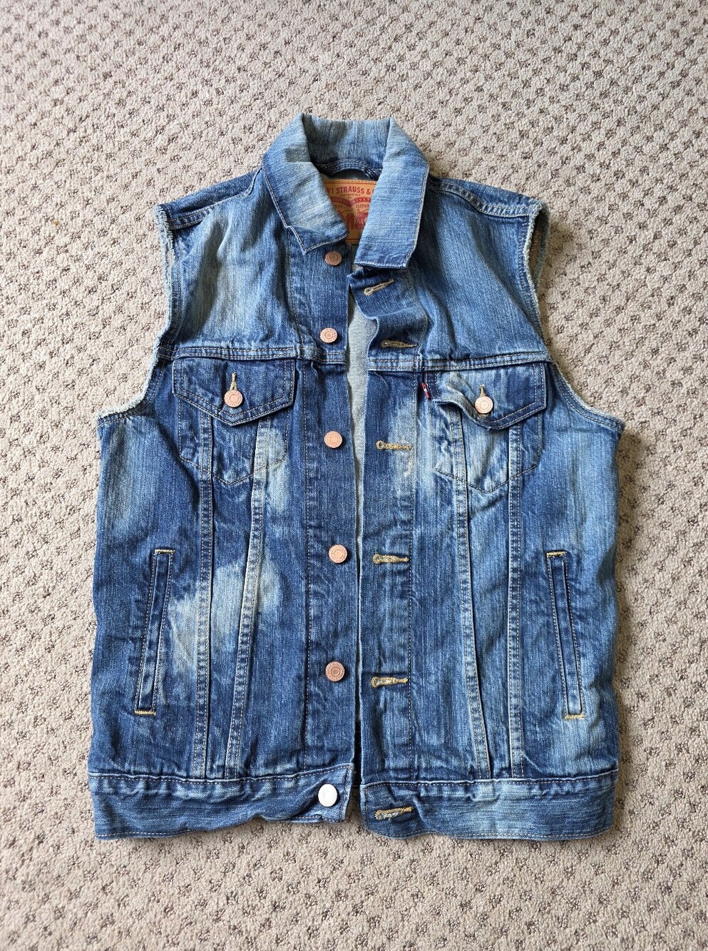 Levi's Denim Jacket with Red Logo Patch on Blue Wash